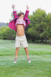 Little boy jumping in the park