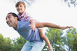 Happy father and son playing airplane