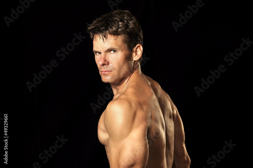 Photo: Muscular shirtless man Muscular shirtless man