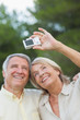 Older couple smiling for a photo 