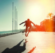 Silhouette of skateboarder