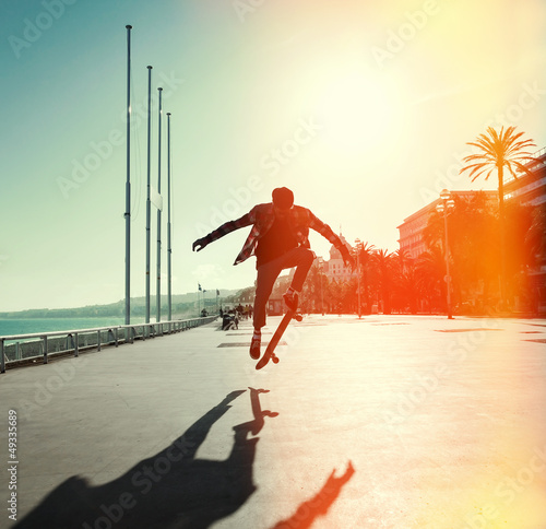 Photo: Silhouette of skateboarder Silhouette of skateboarder