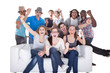 Photo: Group Of Friends Enjoying Watching Television Group Of Friends Enjoying Watching Television