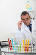 biologist with test-tubes