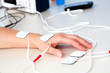 Foto: electrodes electric massage in physiotherapy room. tens therapy, electrodes electric massage in physiotherapy room. tens therapy,
