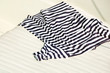 Drying t-shirt on a deck of a boat