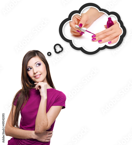 Photo: smiling thinking woman looking up smiling thinking woman looking up