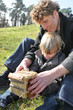 Family and son building an object
