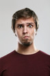 Portrait of young man with thoughtful expression
