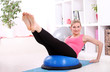 Photo: Beautiful middleaged woman doing fitness Beautiful middleaged woman doing fitness