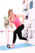 Photo: Beautiful middleaged woman doing fitness Beautiful middleaged woman doing fitness