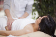 Cute young woman getting a massage at home