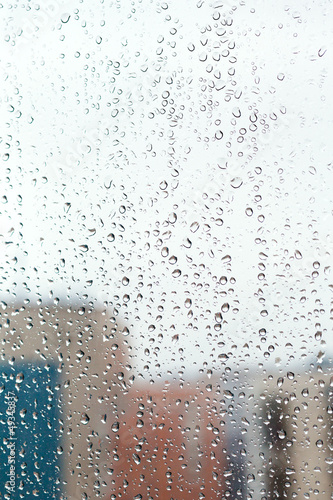 Photo: raindrops on home glass window raindrops on home glass window