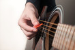 Female hand playing acoustic guitar.guitar play.