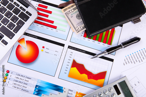 Photo: Financial papers on the table Financial papers on the table