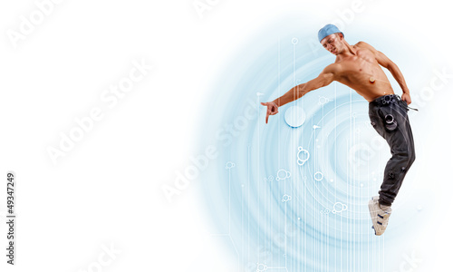 Photo: young man dancing hip hop with color lines young man dancing hip hop with color lines