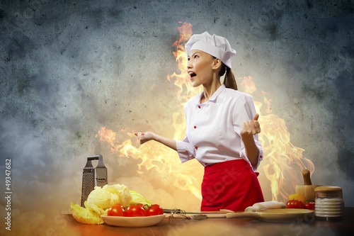 Photo: Asian female cook in anger Asian female cook in anger