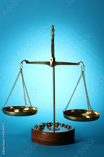 Photo: Classic scales on blue background Classic scales on blue background