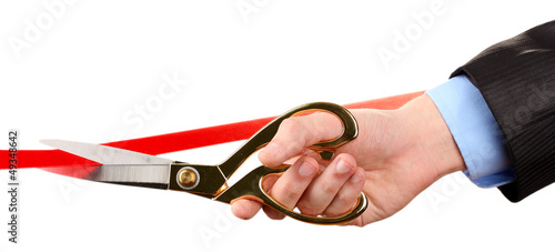 Photo: Cutting red ribbon, isolated on white Cutting red ribbon, isolated on white