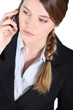 Young businesswoman on the phone.