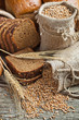 fresh bread and wheat on the wooden