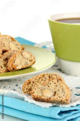 Photo: Aromatic cookies cantuccini on napkin isolated on white Aromatic cookies cantuccini on napkin isolated on white