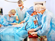 Surgeon at work in operating room.