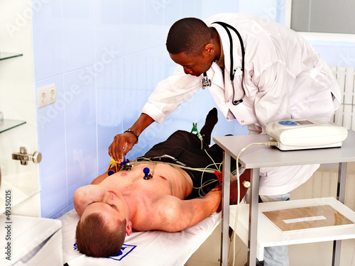Photo: Ecg test of man. Ecg test of man.