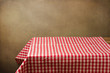 Background with table and tablecloth over grunge background