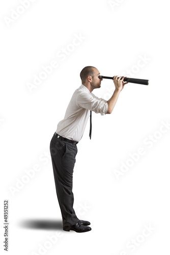 Photo: Businessman with telescope Businessman with telescope