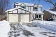 House in the Suburb After Heavy Snow