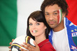Couple supporting the Italian football team