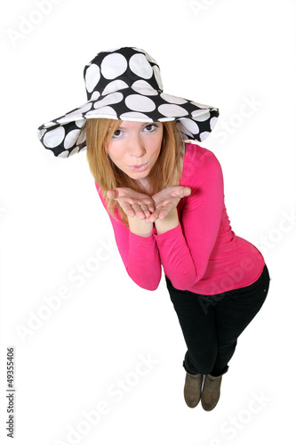 Photo: Young woman blowing you a kiss Young woman blowing you a kiss