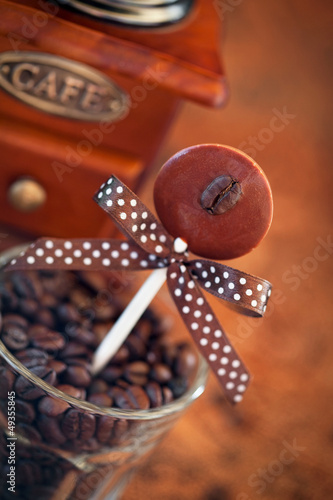 Photo: Chocolate coffee flavored lollipops, selective focus Chocolate coffee flavored lollipops, selective focus