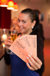 canvas print picture - Woman in theatre presenting tickets
