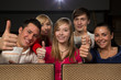 Happy people in movie theatre