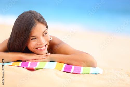 Photo: Relaxing beach woman happy Relaxing beach woman happy