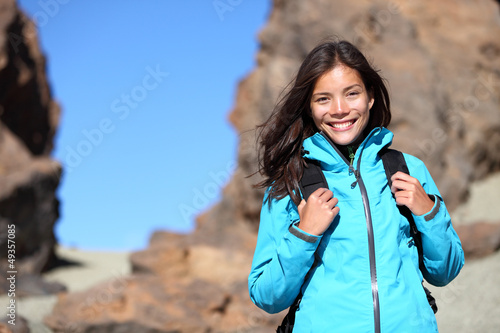 Photo: People hiking - hiker woman happy portrait People hiking - hiker woman happy portrait
