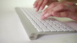 Video: finers type on silver keyboard finers type on silver keyboard