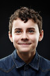 Close-up portrait of smiling young boy