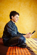 Young boy playing on tablet