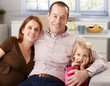 Portrait of happy family at home