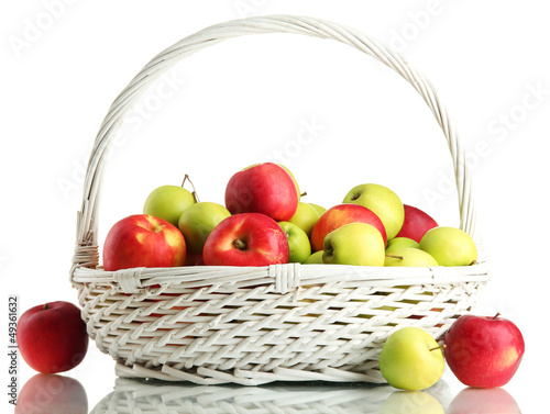 Photo: juicy apples in basket, isolated on white juicy apples in basket, isolated on white