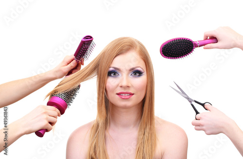 Photo: Beautiful woman and hands with brushes, scissors and hairdryer Beautiful woman and hands with brushes, scissors and hairdryer