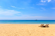 Foto: beds and umbrella on a beach beds and umbrella on a beach