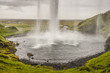 View behind Seljalandsfoss waterfall, Iceland