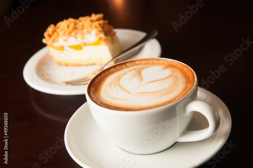 Photo: cappuccino cup with cake cappuccino cup with cake