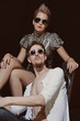 Young men and women wearing a stylish sunglasses