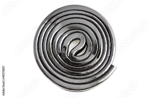 Photo: Black liquorice on white background Black liquorice on white background