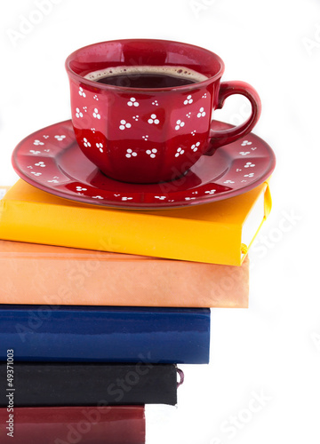 Photo: Coffee Cup on Pile of books Coffee Cup on Pile of books